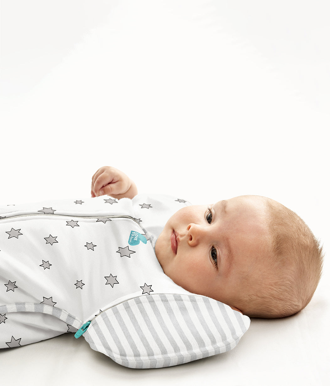 Swaddle Up™ Borsa fasciatoio di transizione in bambù leggero color crema Superstar