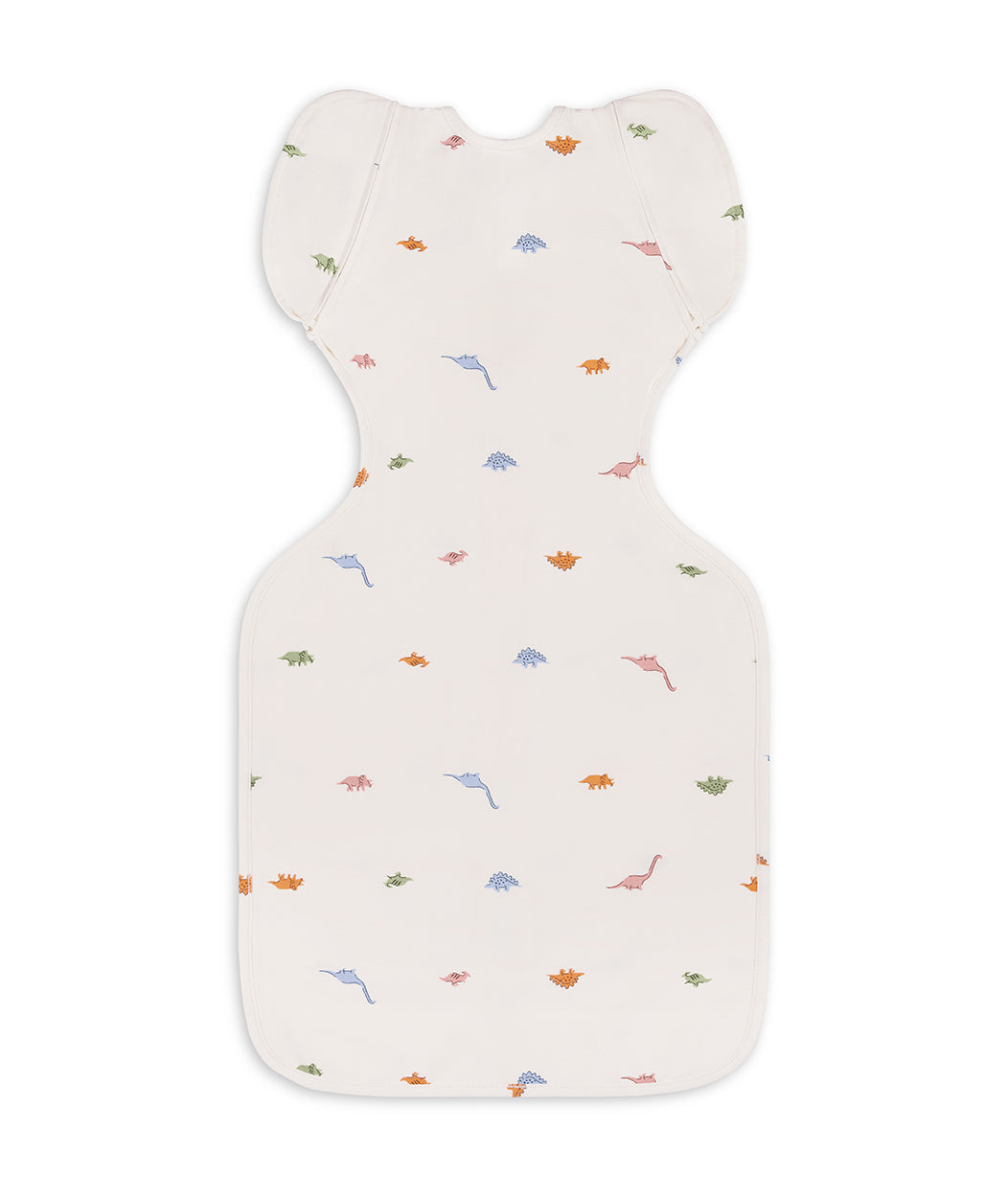 Fasciatoio transizione 2 in 1 Swaddle Up™ 1.0 TOG cotone crema Dino-russamento