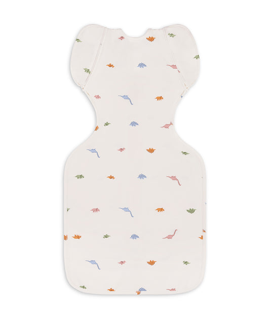 Fasciatoio transizione 2 in 1 Swaddle Up™ 1.0 TOG cotone crema Dino-russamento